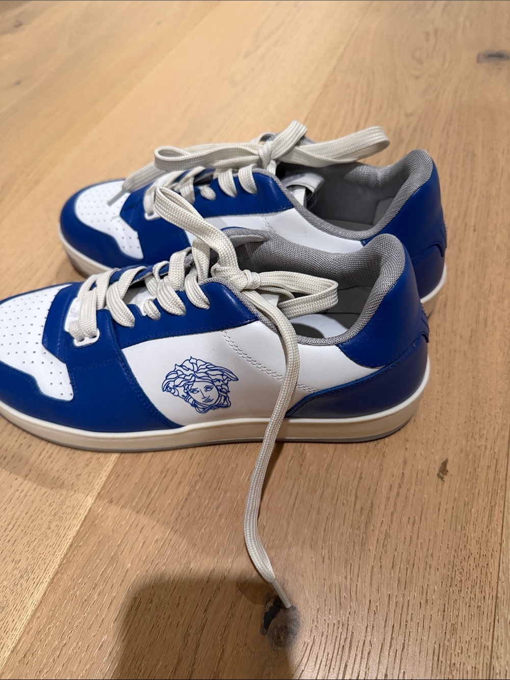 Versace Medusa White and Blue Low-Top Sneakers with Logo Detail.